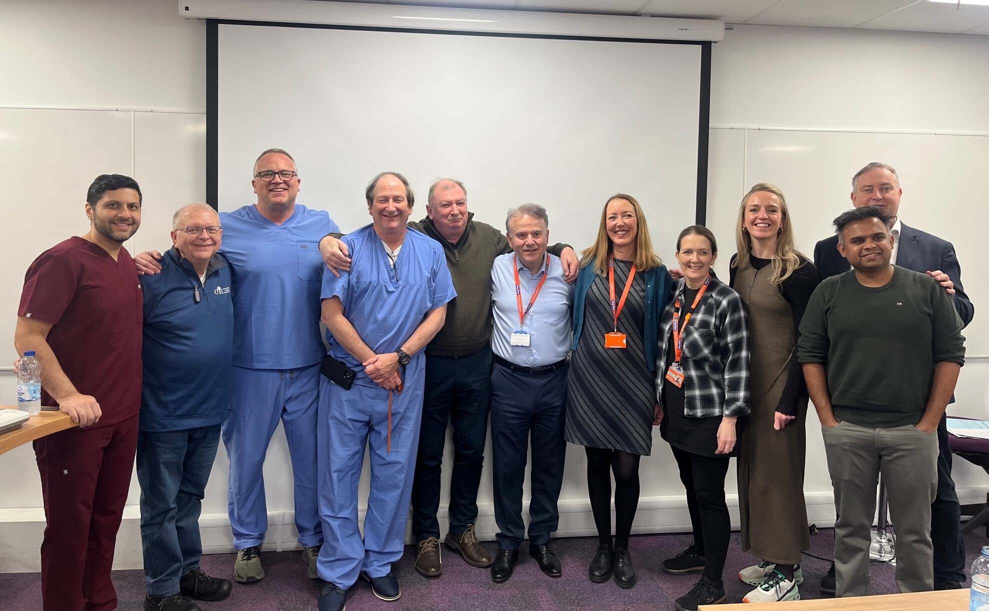 PBC and friends get together for a group photo in a lab in the University of Leeds